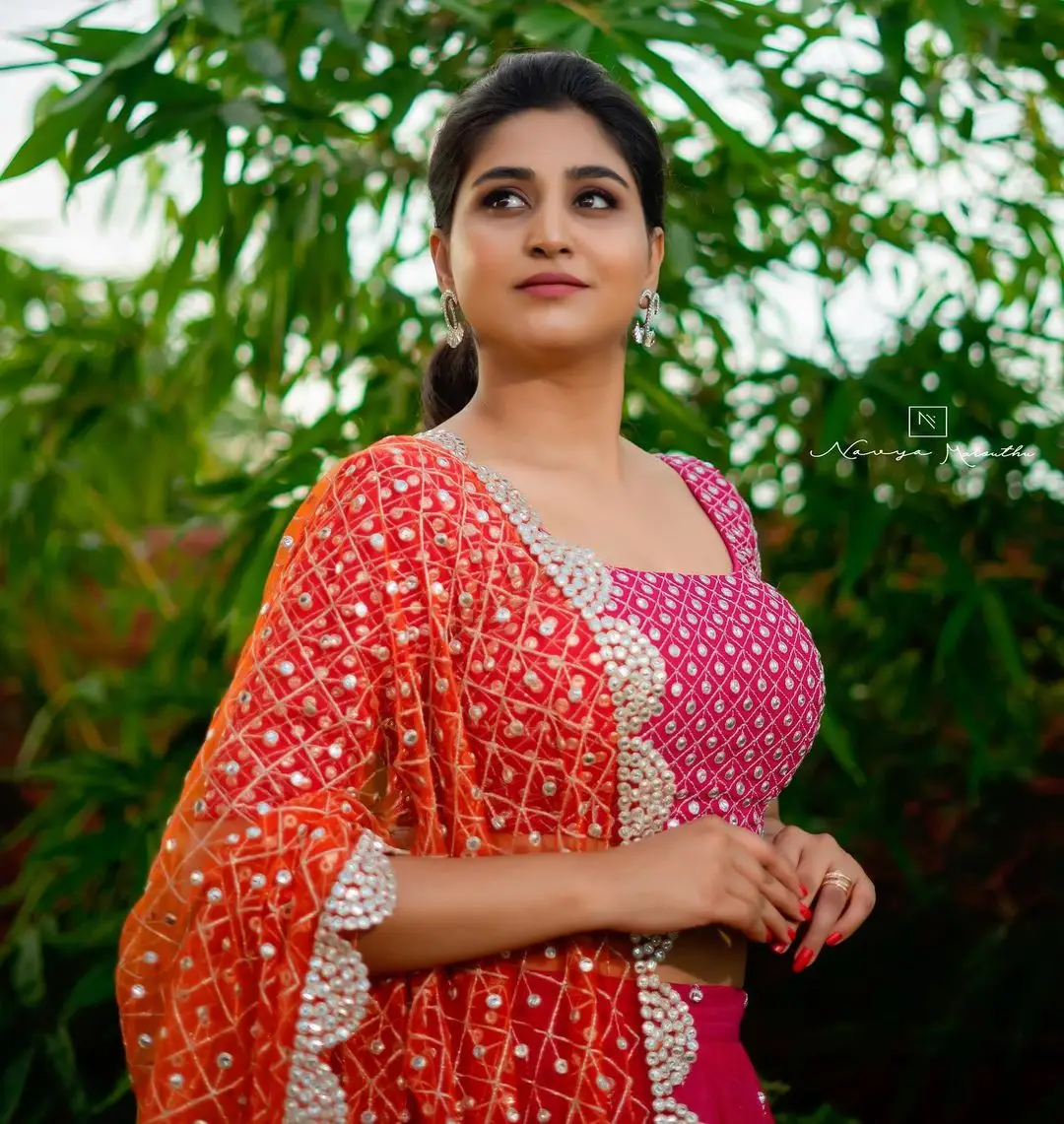 Varshini Sounderajan Wearing Orange Lehenga Choli